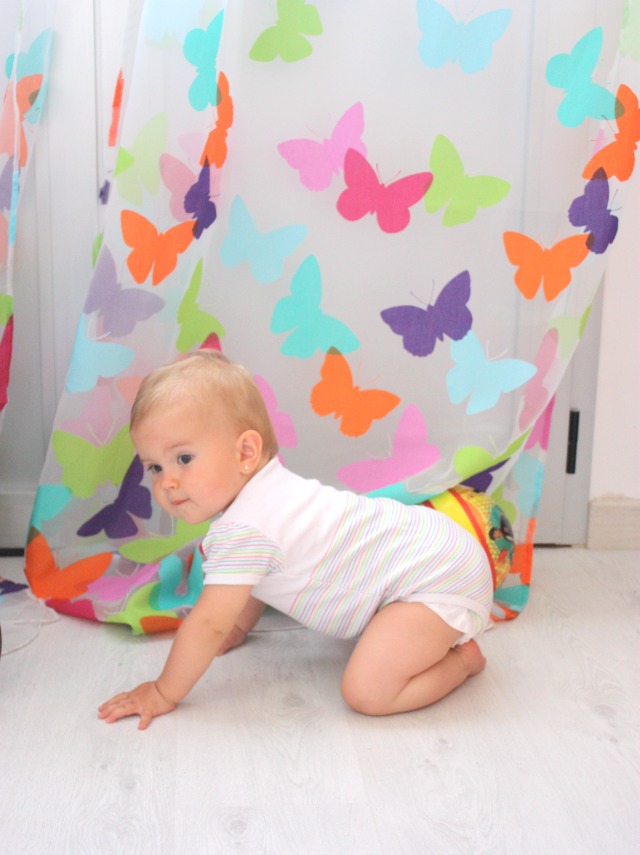 Colorful curtains are a great way to cheer up a kids room