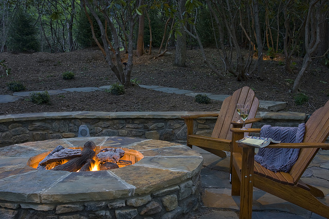 4 Exotic Ideas for a Relaxing Patio Design - stone fire pit