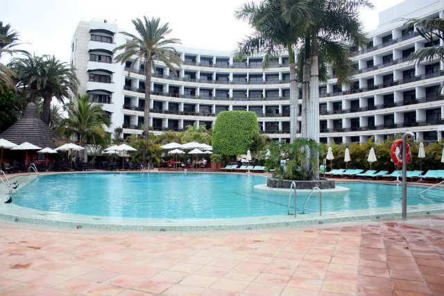 Seaside Palm Beach hotel building & pool