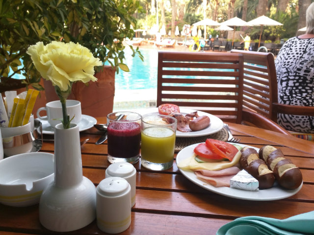 Seaside Palm Beach breakfast by the pool